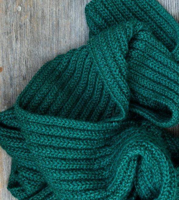 The ribbed knitting pattern creates a scarf with a lovely drape.