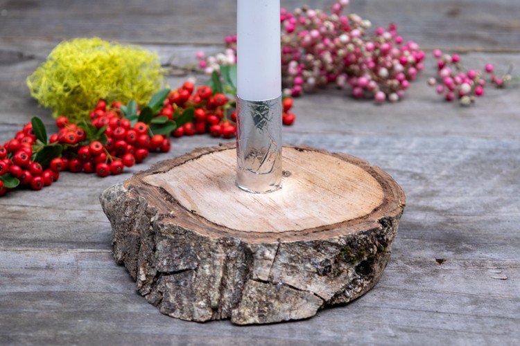 Fit your candle into your candleholder log base